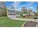Charming two-story home with manicured lawn and flowerbeds at 106 Gateway Pt, Peachtree City, GA 30269