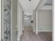 Foyer leading to a view of the kitchen showcasing stylish gray color scheme at 106 Gateway Pt, Peachtree City, GA 30269