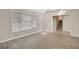 Hardwood floor living room with views of entry, window and staircase at 106 Gateway Pt, Peachtree City, GA 30269