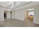 Spacious living area with views of stairs and dining room, featuring hardwood floors at 106 Gateway Pt, Peachtree City, GA 30269