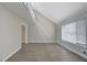 Spacious living room featuring high ceilings, large windows, and hardwood floors at 106 Gateway Pt, Peachtree City, GA 30269