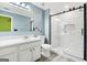 Modern bathroom with a walk-in shower featuring sleek black hardware at 6887 Slate Stone Se Way # 3, Mableton, GA 30126