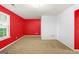 Bright bedroom with carpet floors, white walls, and large windows at 6887 Slate Stone Se Way # 3, Mableton, GA 30126