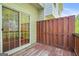 Wooden deck with a sliding glass door and wooden fence for privacy at 6887 Slate Stone Se Way # 3, Mableton, GA 30126