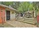 Backyard featuring a wooden deck and grill, perfect for outdoor entertaining at 2008 Highway 92 S, Fayetteville, GA 30215