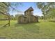 Rustic barn with a lookout platform, offering a unique and scenic addition to the property at 2008 Highway 92 S, Fayetteville, GA 30215