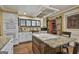 Well-equipped kitchen with central island, granite counters, and ample storage at 2008 Highway 92 S, Fayetteville, GA 30215