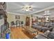 Large living room featuring a fireplace, hardwood floors, and an open floor plan at 2008 Highway 92 S, Fayetteville, GA 30215
