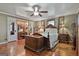 Main bedroom with beautiful hardwood floors, natural light, and elegant furnishings at 2008 Highway 92 S, Fayetteville, GA 30215