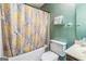 Bathroom with floral shower curtain at 675 Granby Hill Pl, Alpharetta, GA 30022