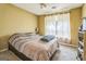 Cozy bedroom with a comfortable bed, soft lighting, and neutral tones at 675 Granby Hill Pl, Alpharetta, GA 30022