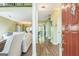 Inviting foyer with wood flooring, leading into an open living room and dining area at 675 Granby Hill Pl, Alpharetta, GA 30022