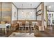 Inviting dining area with custom built-in bench seating, rustic accents, and decorative lighting at 238 Indian Creek Rd, Locust Grove, GA 30248
