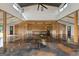 Huge open space featuring wood beams, high ceilings, with a rustic modern style and smooth concrete floor at 238 Indian Creek Rd, Locust Grove, GA 30248