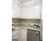 Clean kitchen with plenty of storage space and stainless steel dishwasher and refrigerator at 6718 Delta Dr, Riverdale, GA 30274