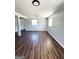 Spacious basement featuring modern flooring and ample natural light at 6505 Allatoona Rd, Morrow, GA 30260