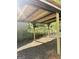 Wooden framed carport features beams, sturdy vertical supports, and a sturdy plywood roof providing reliable protection at 6505 Allatoona Rd, Morrow, GA 30260