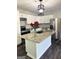 Beautifully updated kitchen with stainless steel appliances and granite countertops at 6505 Allatoona Rd, Morrow, GA 30260
