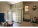 Spare room with built-in cabinets, drop leaf table, and door to outside at 2215 Mount Carmel Rd, Hampton, GA 30228