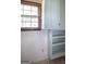 Spare room showing window and built-in shelves with storage above at 2215 Mount Carmel Rd, Hampton, GA 30228