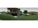 Two-story home with lower garage and upper deck and parking, with a sloped backyard at 2828 Rockcliff Se Rd, Atlanta, GA 30316