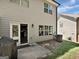 Exterior of home showing a patio area, siding, and well manicured lawn at 488 Jefferson Chase St, Atlanta, GA 30354