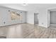 Bright bedroom with natural light, features wood-look floors and neutral paint at 488 Jefferson Chase St, Atlanta, GA 30354