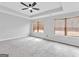 Bedroom featuring natural light and tray ceilings at 488 Jefferson Chase St, Atlanta, GA 30354