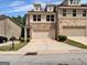 Charming townhome featuring brick accents, a two-car garage, and well-maintained landscaping at 488 Jefferson Chase St, Atlanta, GA 30354