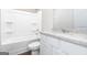 Bathroom featuring granite counters, a vanity with storage, and bathtub at 1033 Claas Way, Locust Grove, GA 30248
