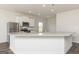 Modern kitchen featuring stainless steel appliances and granite countertops at 1033 Claas Way, Locust Grove, GA 30248