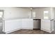 Kitchen area features stainless steel appliances, granite counters, and ample cabinet space at 1033 Claas Way, Locust Grove, GA 30248