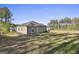 Large backyard with plenty of space and beautiful landscaping at 130 S Meadows Ridge Dr, Grantville, GA 30220