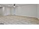Spacious living area with neutral paint, hardwood flooring, and recessed lighting at 130 S Meadows Ridge Dr, Grantville, GA 30220