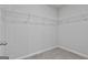 Walk-in closet features carpet flooring, wire shelving, and recessed lighting at 130 S Meadows Ridge Dr, Grantville, GA 30220