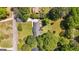 Overhead aerial view of a home featuring a well-maintained yard, lush trees, and outdoor living space at 25 Hickory Dr, Stockbridge, GA 30281
