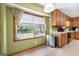 Eat-in kitchen area featuring a window overlooking the back yard at 25 Hickory Dr, Stockbridge, GA 30281