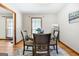 Cozy dining room featuring a round table with chairs, complemented by a rug and bright natural light at 25 Hickory Dr, Stockbridge, GA 30281