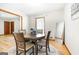 Bright dining room featuring a round table, four chairs, and a decorative rug, creating a cozy space at 25 Hickory Dr, Stockbridge, GA 30281