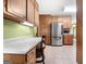 Spacious kitchen featuring stainless steel appliances and ample wooden cabinet space at 25 Hickory Dr, Stockbridge, GA 30281