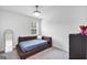 Cozy bedroom with modern bed, ample natural light, and neutral decor at 1393 Halpern Nw Ln, Kennesaw, GA 30144