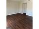 Living room featuring wood floors and neutral walls, offering a warm and inviting space at 3244 Abbeywood Dr, Decatur, GA 30034