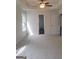 A bright and airy bedroom features plush carpeting and plenty of natural light at 114 Revere Turn, Fairburn, GA 30213