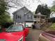 Charming two-story home with attached two car garage and covered front porch at 525 Brooksdale Dr, Woodstock, GA 30189