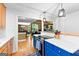 Bright, open concept from kitchen into adjacent dining and living area at 335 Winding Stream Trl, Hampton, GA 30228