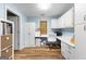 Bright office space with built-in cabinets, drawers, and desk areas at 335 Winding Stream Trl, Hampton, GA 30228