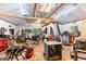 Interior of outbuilding featuring equipment, tools and natural light from a window at 335 Winding Stream Trl, Hampton, GA 30228