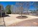 Large backyard featuring a spacious lawn, mature tree, and wooden fence at 2358 New Salem Trce, Marietta, GA 30064