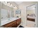 Bathroom with double vanity and walk-in to the bedroom at 2358 New Salem Trce, Marietta, GA 30064