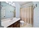 Charming bathroom features patterned wallpaper, vanity and tiled floor at 2358 New Salem Trce, Marietta, GA 30064